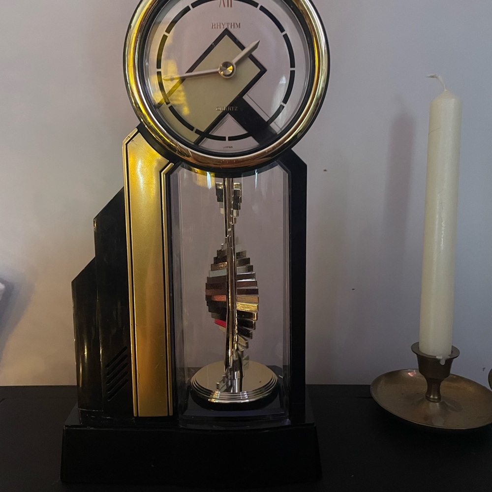 Rhythm. Black and Gold Wall Clock
